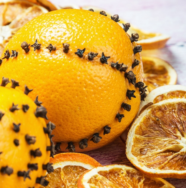 Christmas oranges on a wooden table