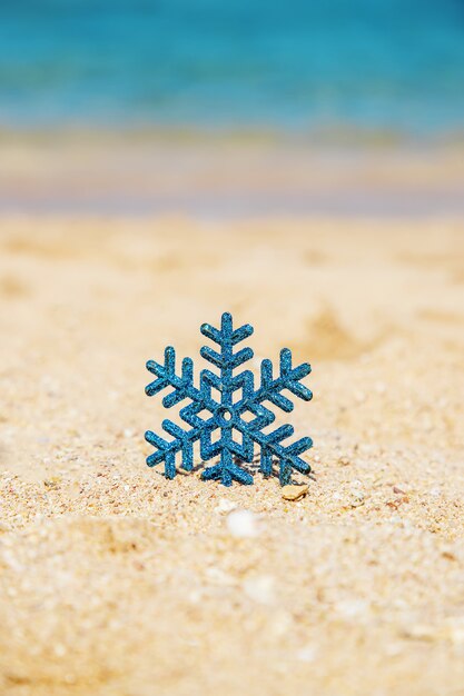 Premium Photo  Silver ring with spiral pattern in the sand on the  background of beach and sea