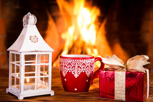 Christmas ornament near fireplace. Winter holiday concept