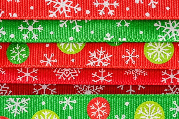 Christmas ornament packing ribbons in rows close up