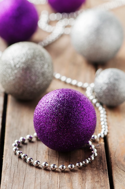 Christmas ornament with balls on the wooden table