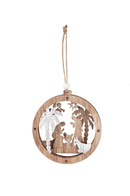 A christmas ornament with a palm tree and the word nativity on it.