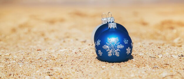Christmas ornaments on the beach