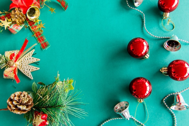 Christmas ornaments on green background