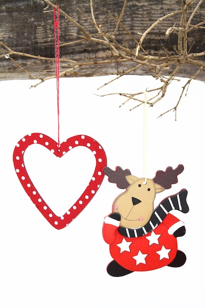 Christmas ornaments hanging on a branch