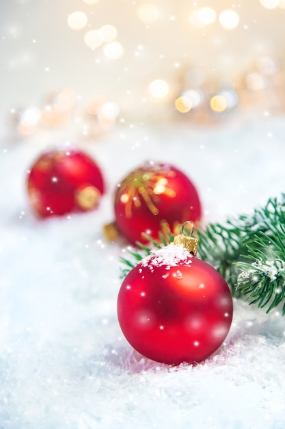 Christmas ornaments on snow