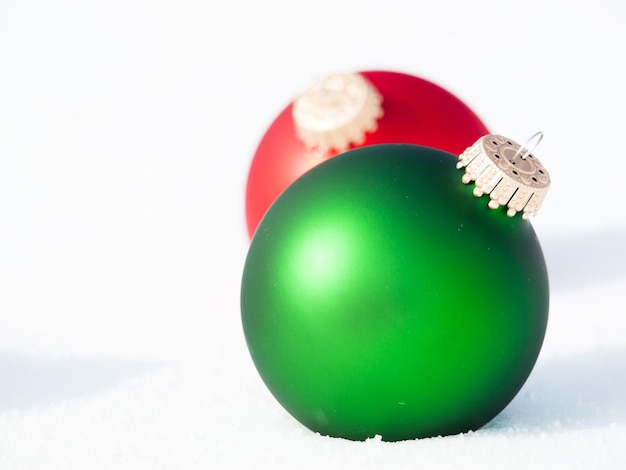 Christmas ornaments in virgin snow.