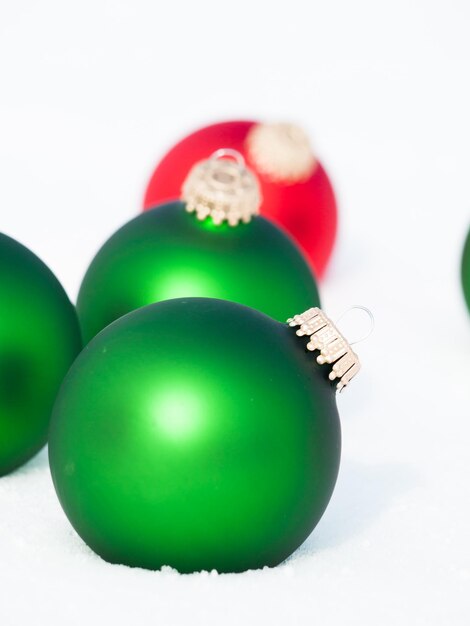 Christmas ornaments in virgin snow.