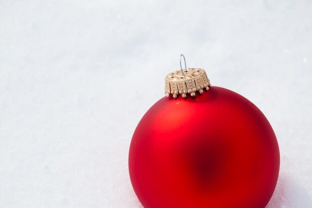 Christmas ornaments in virgin snow.