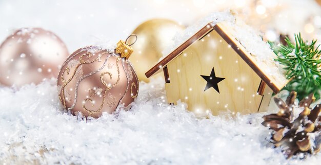 Christmas ornaments with spruce and snow