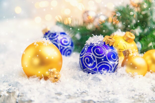 Christmas ornaments with spruce and snow