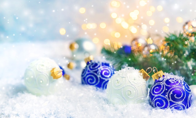 Christmas ornaments with spruce and snow