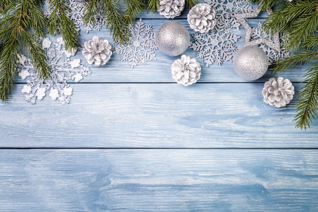 Christmas ornaments on the wooden background. Copy Space for text.