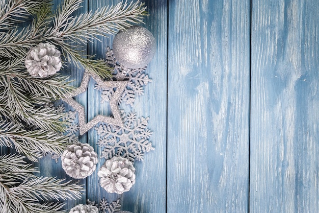 Christmas ornaments on the wooden background. Copy Space for text.