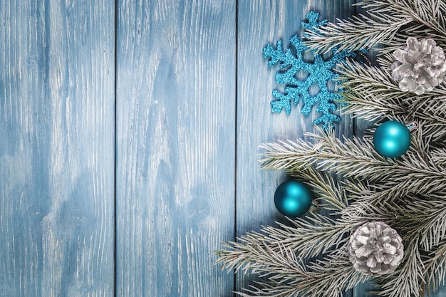 Christmas ornaments on the wooden background. Copy Space for text.