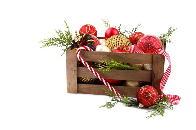 Christmas ornaments in a wooden crate