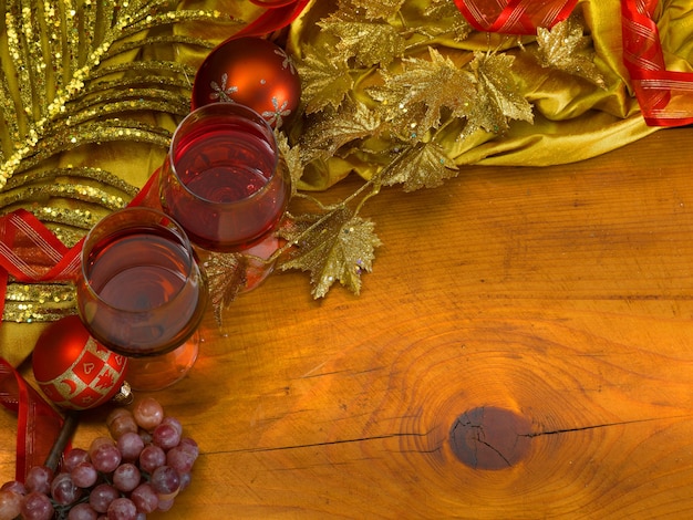 Christmas party with toast of red wine glasses and elegant colored decorations