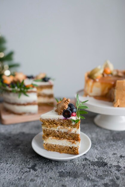 Christmas pastries decorated with berries on the table