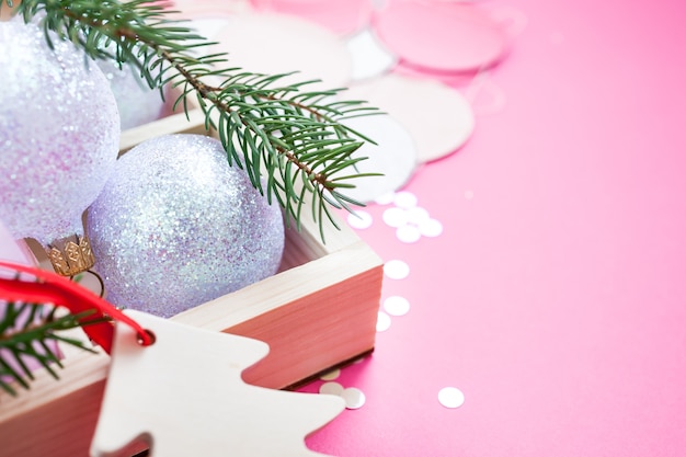 Christmas pearl decoration balls pink background