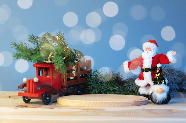 Christmas pedestal for the product, still life composition, with a car, Santa and dwarf