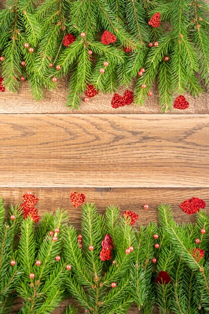 Christmas pine branches on a wooden table