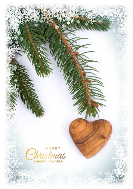 Christmas postcard. Background with ornaments for greeting card, wooden heart and love, space for text