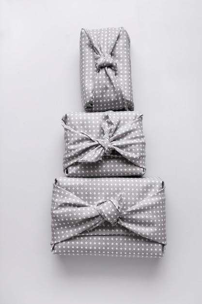 Christmas presents wrapped in textile