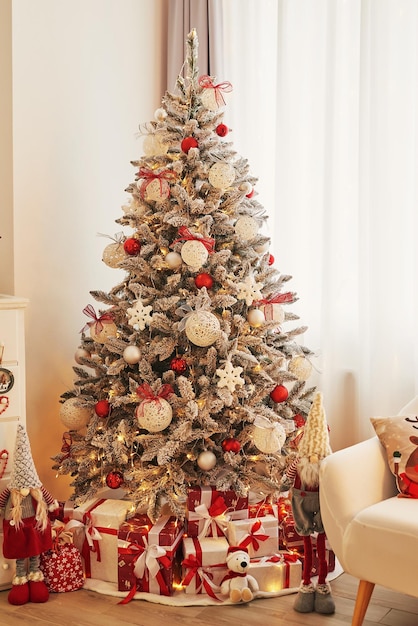 Christmas room. Red and white decor christmas tree background. New Year celebration. Merry Christmas and Happy New Year.