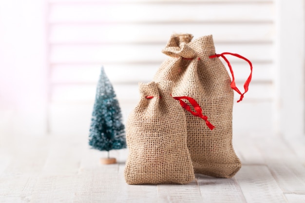 Christmas sack with presents, closeup with copy space