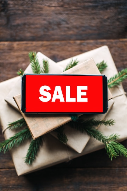 Photo christmas sale xmas online shopping winter holiday sales black friday cell phone with red screen