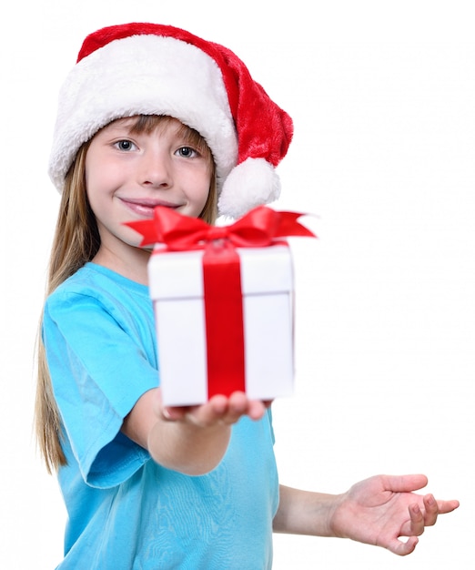 Foto ragazza di babbo natale con regalo.