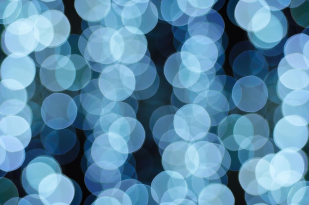 Christmas shiny light bokeh in blue colors