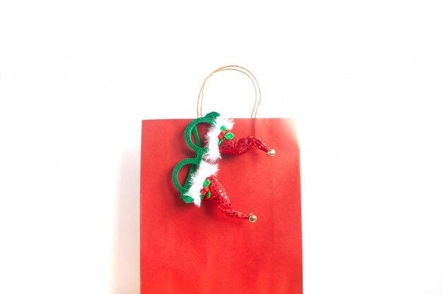 Christmas shopping bag on white background