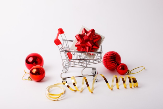 Christmas shopping cart for supermarket with gift