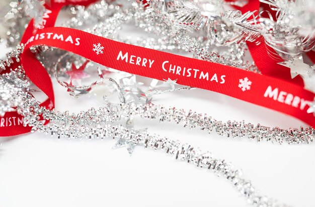 Christmas silver tinsel with Merry Christmas lettering.