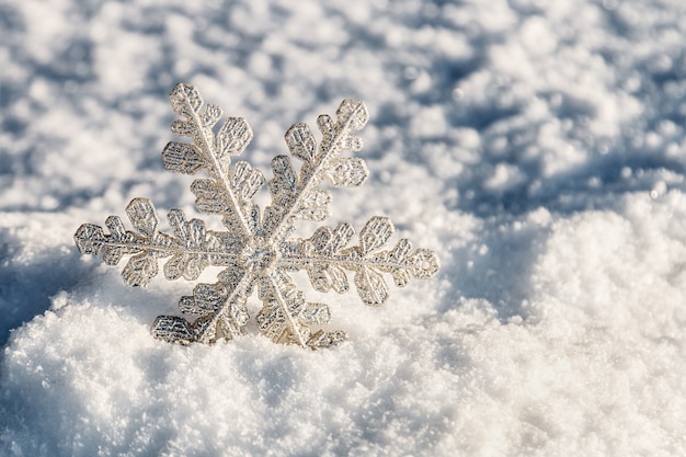 Christmas snowflakes on snow