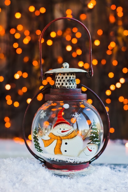 Christmas snowman in a lantern