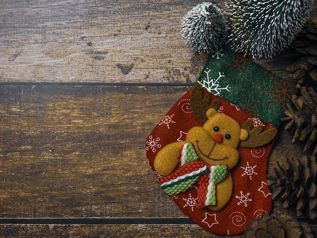 Christmas sock on wood table for holiday concept