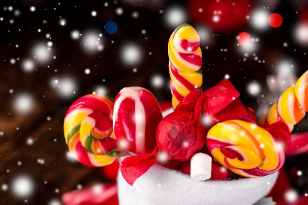 Christmas socks full of candy and sweets. Closeup of candies. Macro.