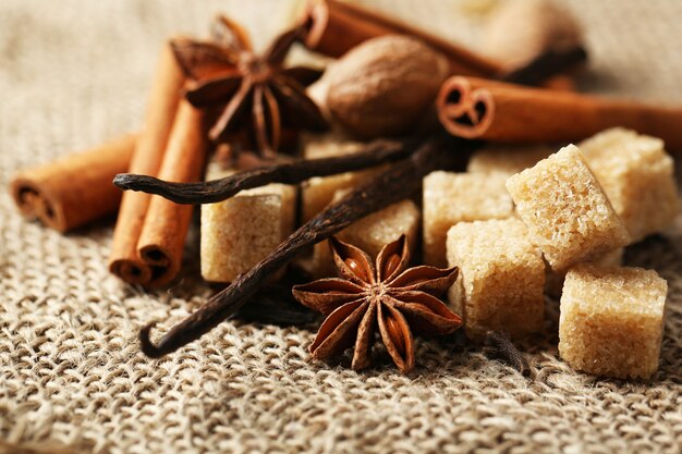 Christmas spices and baking ingredients on sackcloth