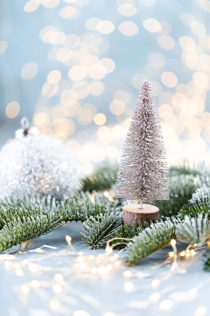 Christmas spruce with tree and blurred shiny lights