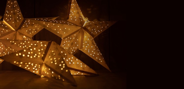 Christmas star decoration with lights garland, banner, place for text.