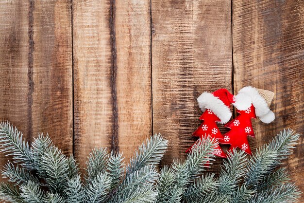 Christmas star and santa hat, decor on pastel blue background.