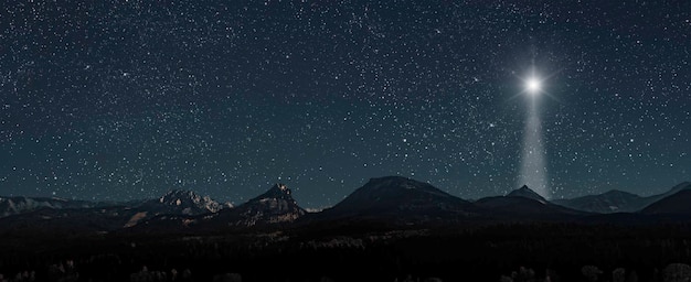 写真 クリスマススターは夜にベツレヘムの山の上に輝く