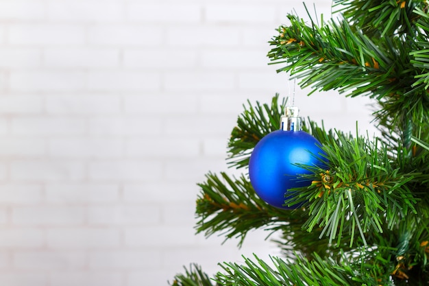 Christmas still life, blue tree toy on a wooden table