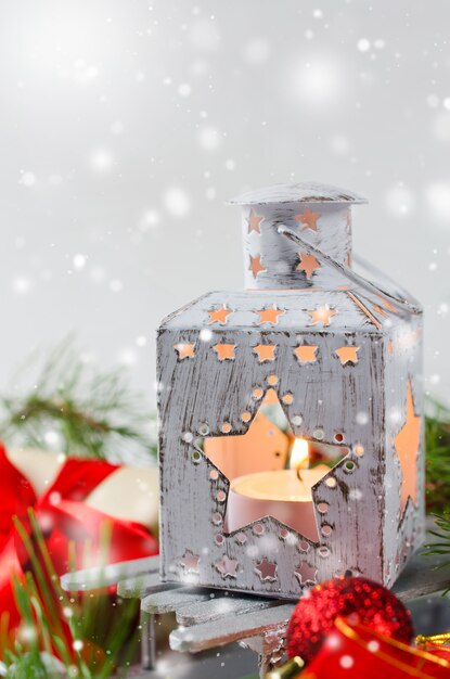 Christmas still life with lantern and decorations