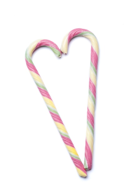 Christmas stylish pink candy cane isolated on a white