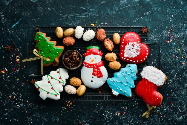 Фото Рождественские сладости пряники и конфеты баннер вид сверху сладкий бар