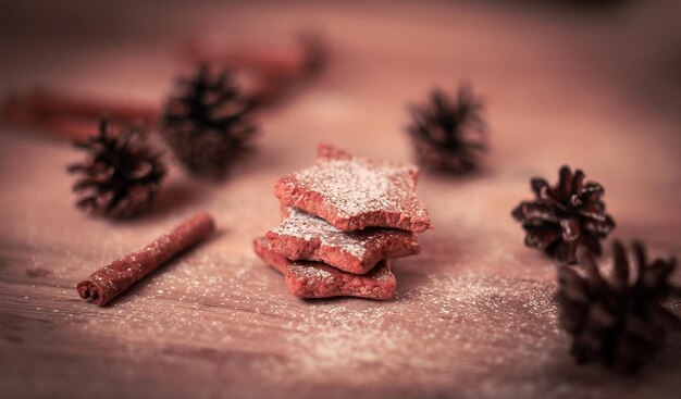 Christmas table blurred image homemade cookies on wooden backg