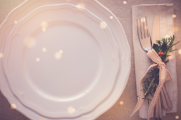 Christmas table place setting, holidays copy space background